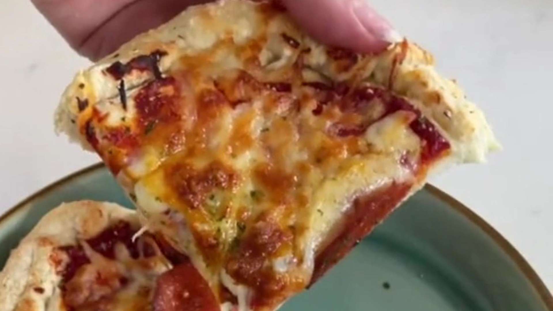 I made a pizza in my air fryer using just two ingredients for the dough – it tastes amazing & is less than 500 calories