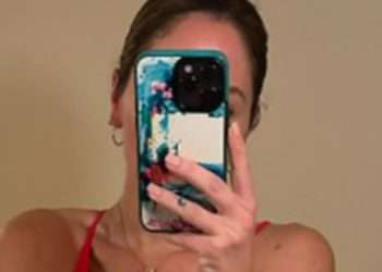 Ex-UFC octagon girl Brittney Palmer puts on cheeky display sunbathing in red bikini as fans label her ‘amazing’