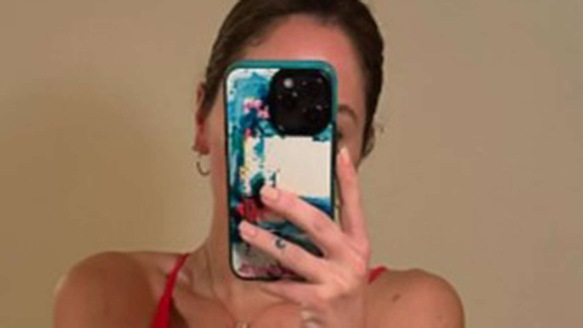 Ex-UFC octagon girl Brittney Palmer puts on cheeky display sunbathing in red bikini as fans label her ‘amazing’