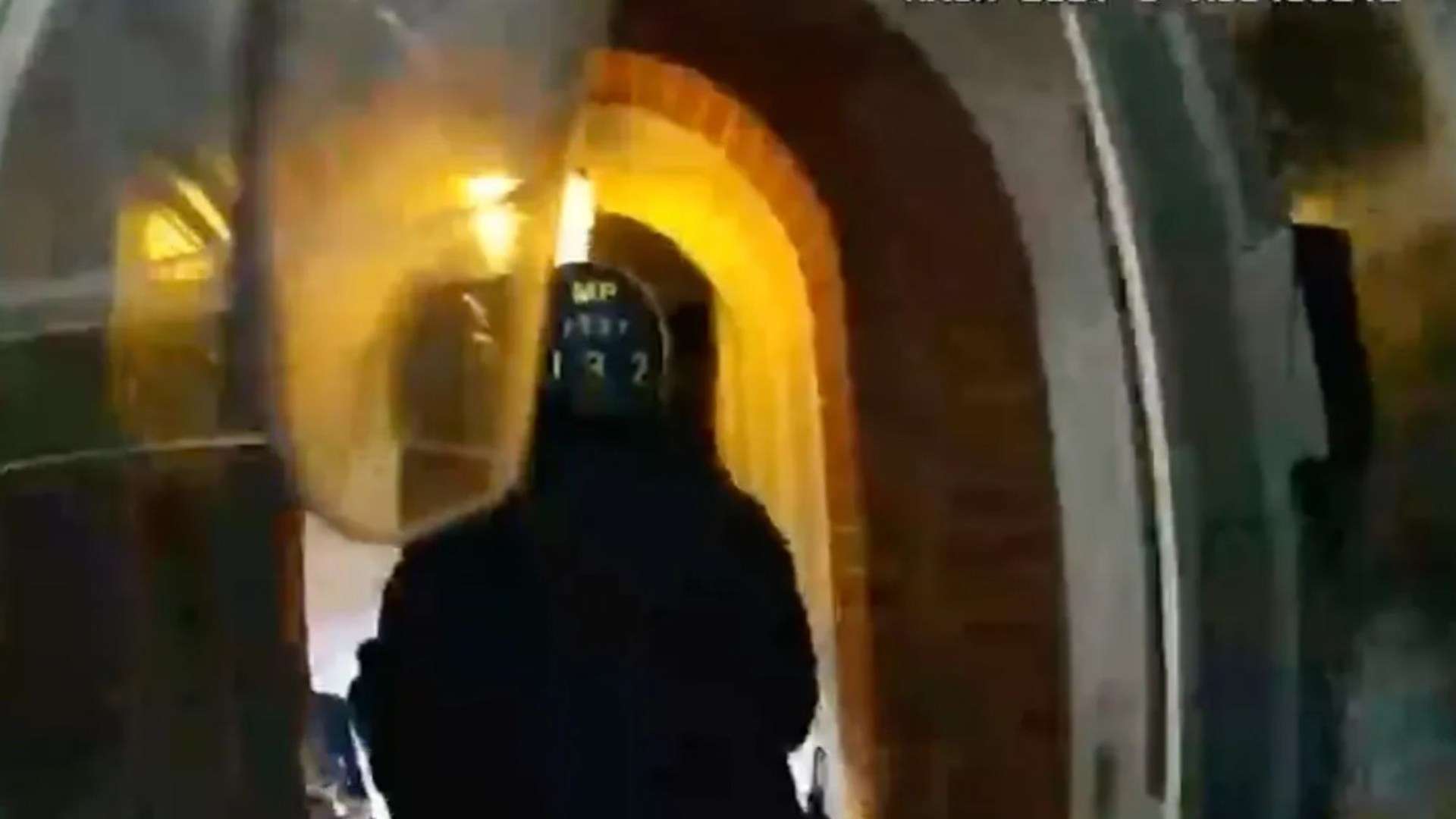 Terrifying moment cops are shot at by armed thug during dramatic raid of house