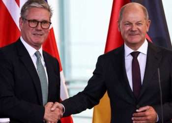 Keir Starmer leaves door open for MILLIONS of migrants to move to Britain while cosying up to EU in Berlin