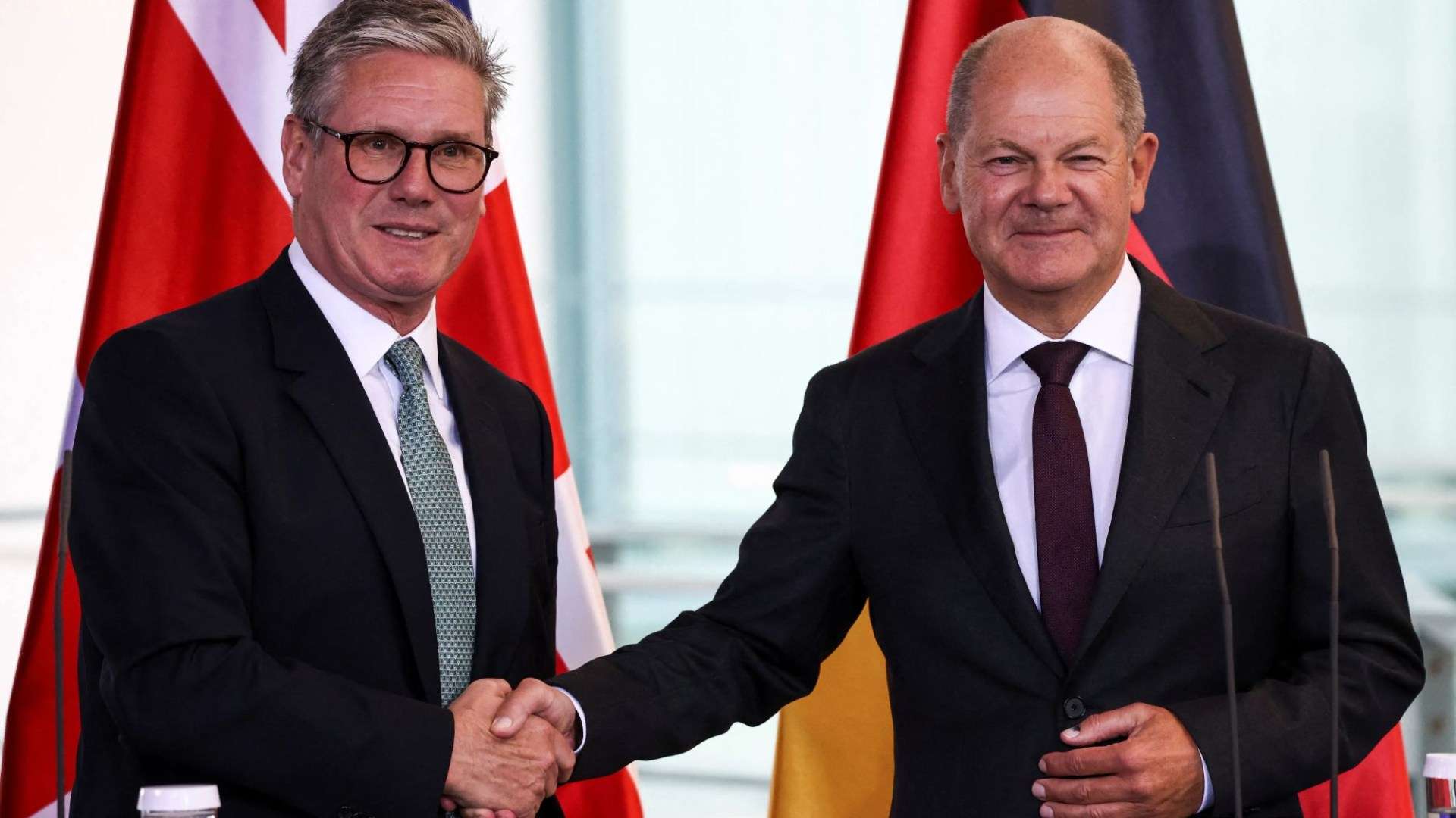 Keir Starmer leaves door open for MILLIONS of migrants to move to Britain while cosying up to EU in Berlin