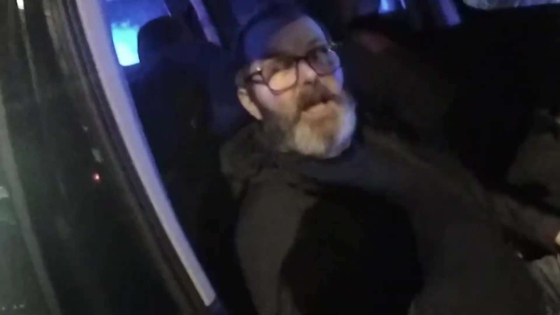 Moment thug who stabbed wife so severely the knife SNAPPED says ‘not bothered’ as he’s arrested while on run with son