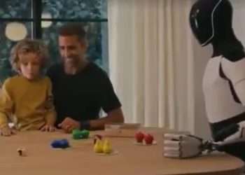 Watch moment Elon Musk unveils creepy faceless Optimus robots that he boasts can ‘do anything’ – even ‘babysit kids’