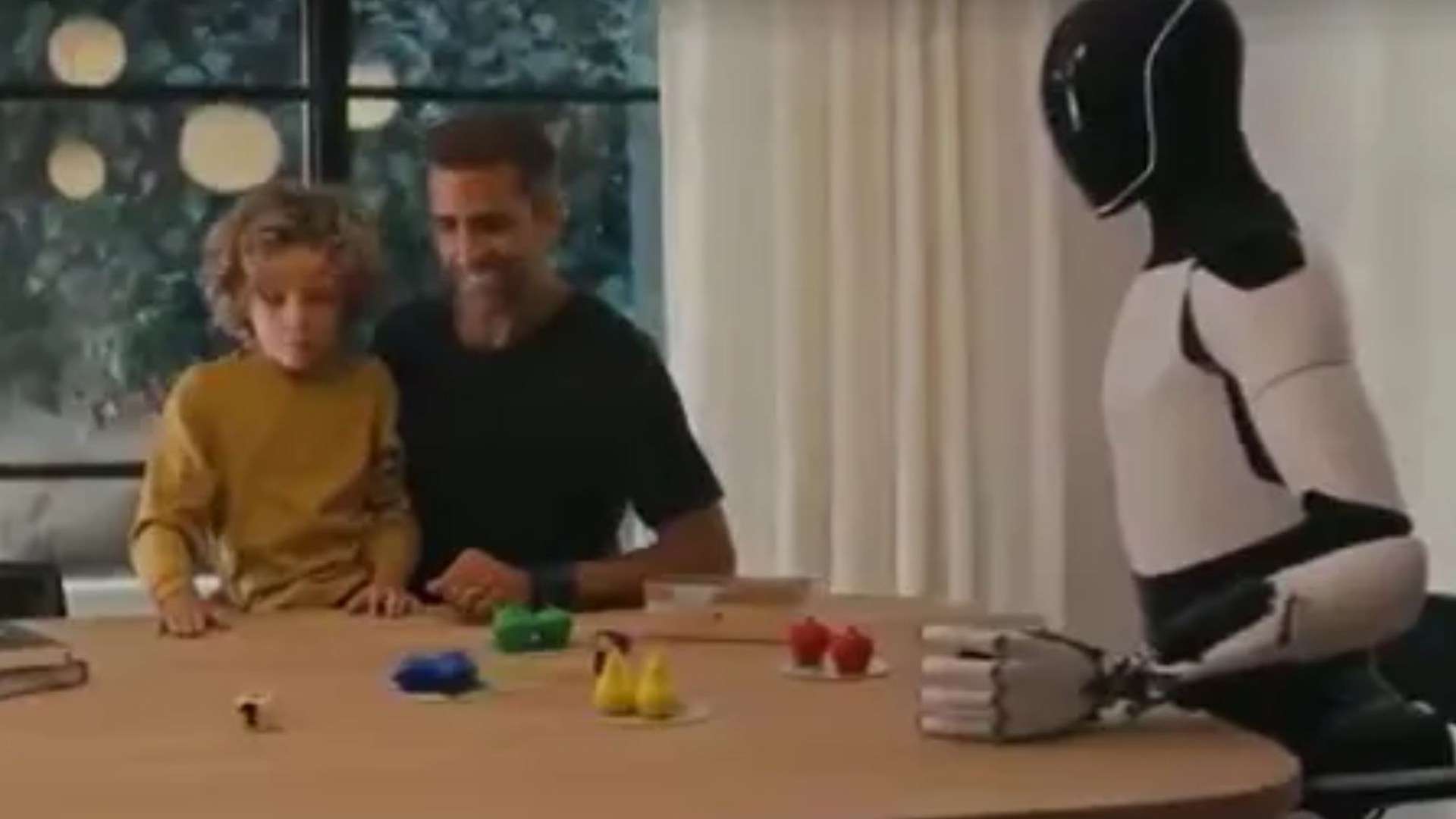 Watch moment Elon Musk unveils creepy faceless Optimus robots that he boasts can ‘do anything’ – even ‘babysit kids’