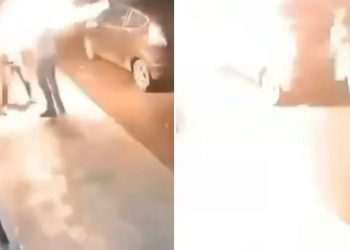 Shocking moment man is PETROL BOMBED in face by axe-wielding yob who stormed bar, smashed bottles & made off with till