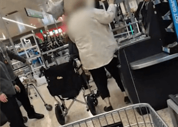 Wild moment OAP hurls her shopping at customers at Morrisons self-checkout as staff forced to break up vicious brawl