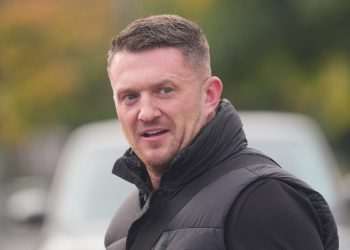 Cops issue update on Tommy Robinson ‘assault victim’ probe as he hunkers down abroad after St Pancras video