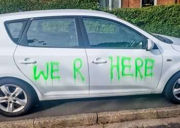 Urgent hunt for yobs who destroyed FORTY ONE cars in ‘sleepy and peaceful’ UK town – as cops probe bizarre messages