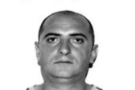 Albanian pimp who forced girlfriend to work in brothel before sneaking into UK on fake passport allowed to walk streets